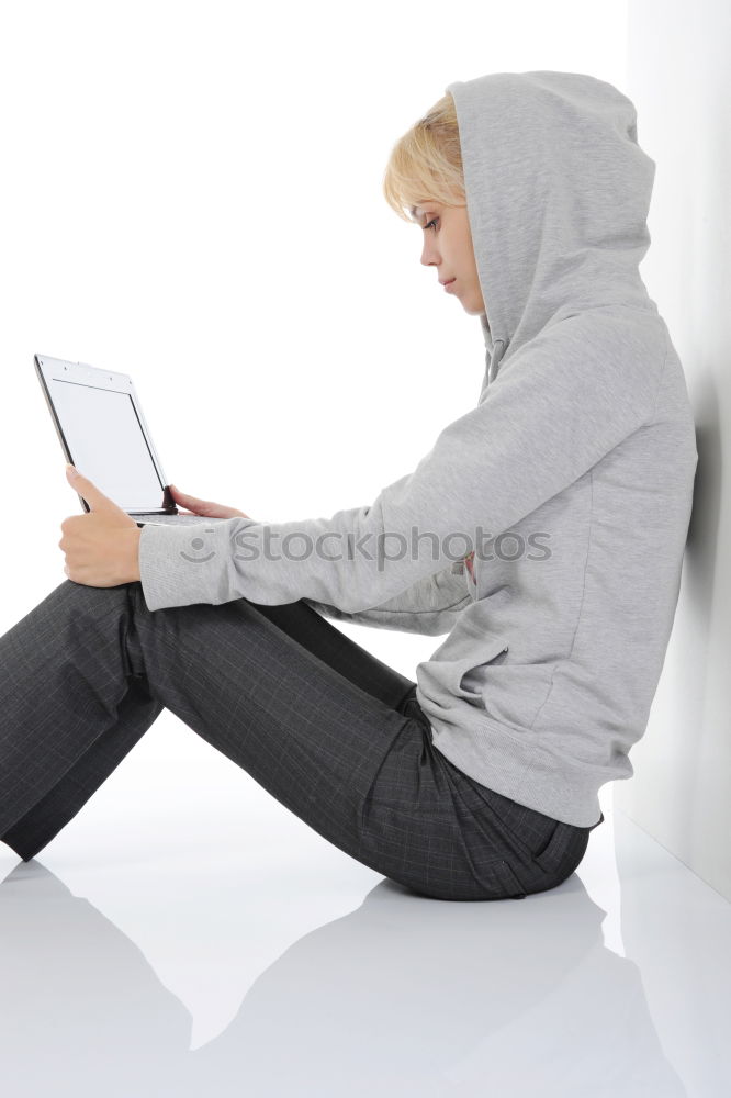 Similar – Image, Stock Photo young boy looking at tablet pc computer with frustrated look on his face