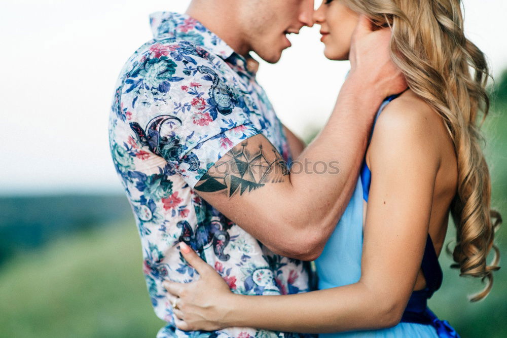 Similar – Image, Stock Photo Happy couple hugging and kissing near tree in park