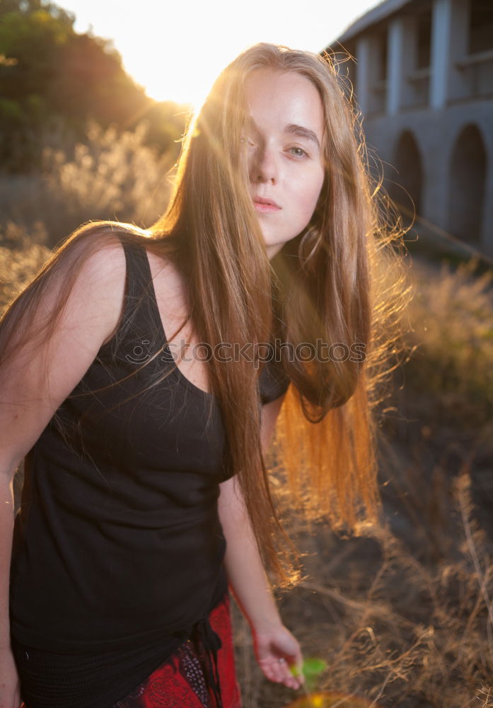 Similar – Young redhead woman holding an analog camera