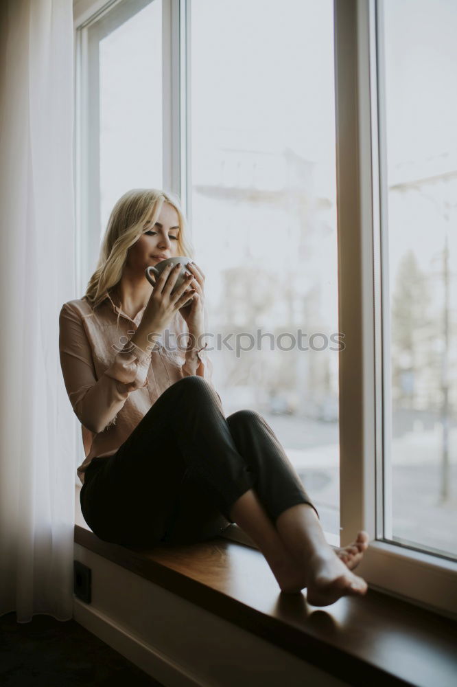 Similar – Image, Stock Photo Thoughtful blonde woman at window