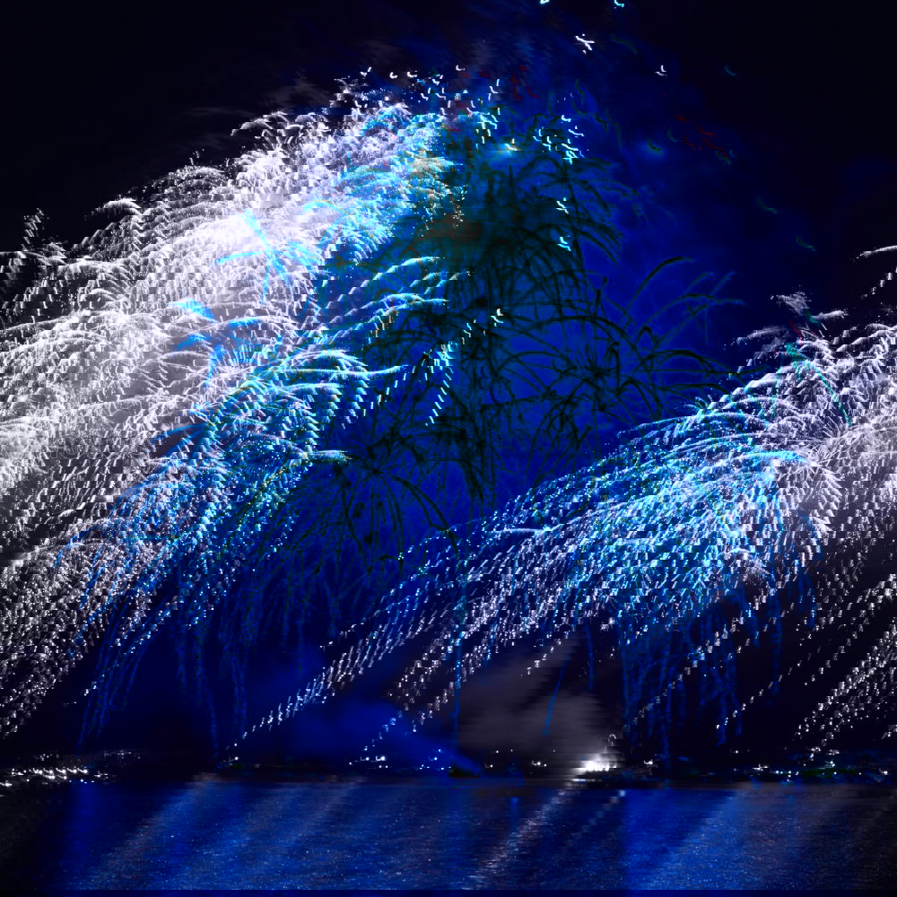 Similar – Image, Stock Photo Blue fireworks on the black sky