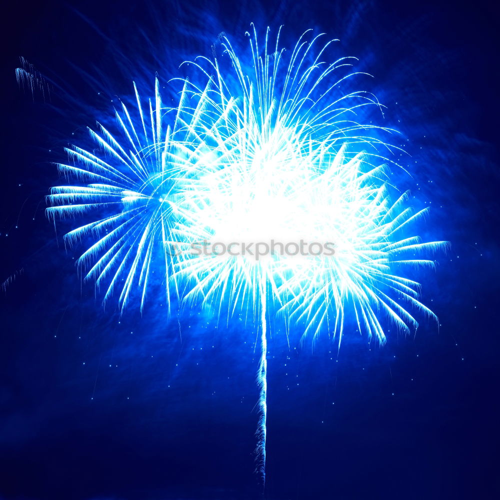 Similar – Blue fireworks with water reflection