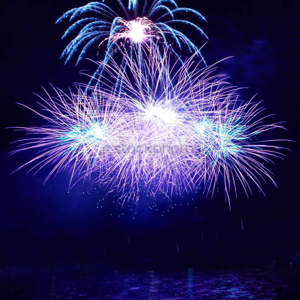 Similar – Blue fireworks with water reflection