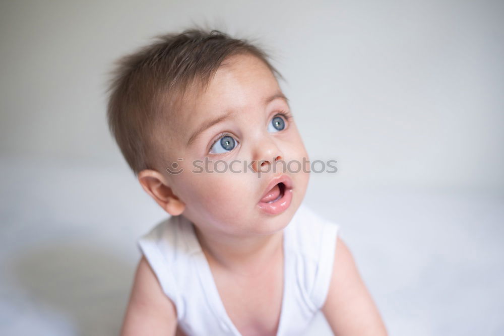 Similar – Little baby girl lying on blanket with colourful polka dots