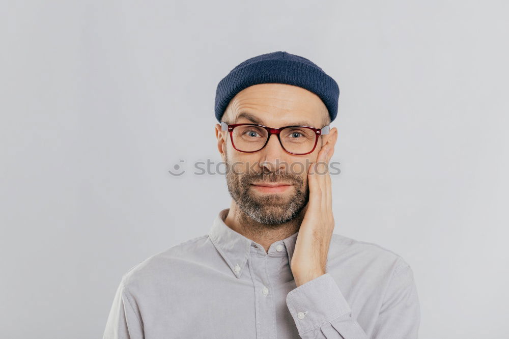 Similar – Portrait of a man with glasses and mustache with crossed arms