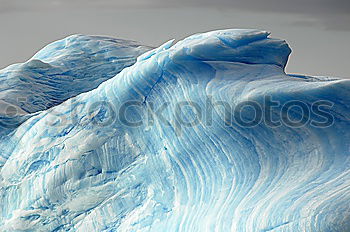 Similar – Wall of glacier in sea