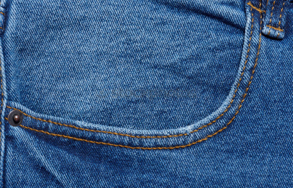 Similar – Textur-Tasche einer blauen, zerknitterten Jeans Makro-Nahaufnahme