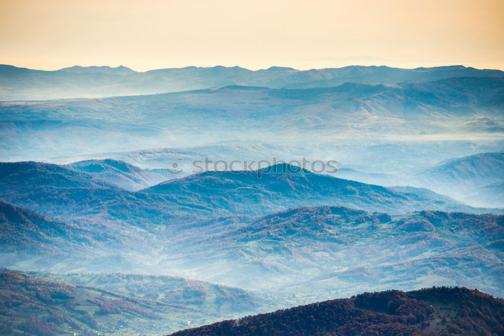 Similar – Blue mountains and hills at sunset