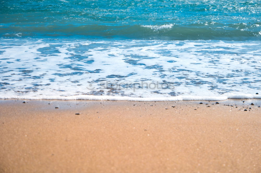 Similar – Image, Stock Photo Endless beach at Rainbow Beach. Walk left at the beach. A car is approaching. In the background a medium high mountain.