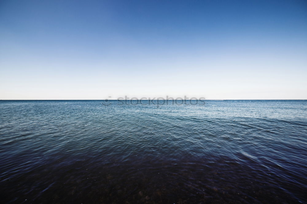 Similar – Image, Stock Photo Man in wetsuit swimming in ocean