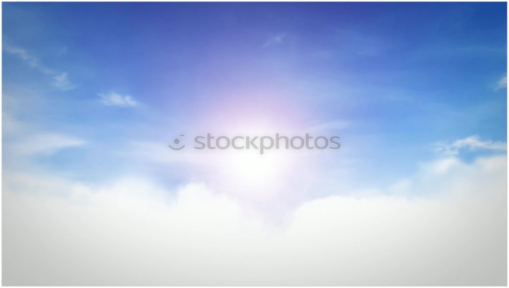 White clouds, bright sun and blue sky