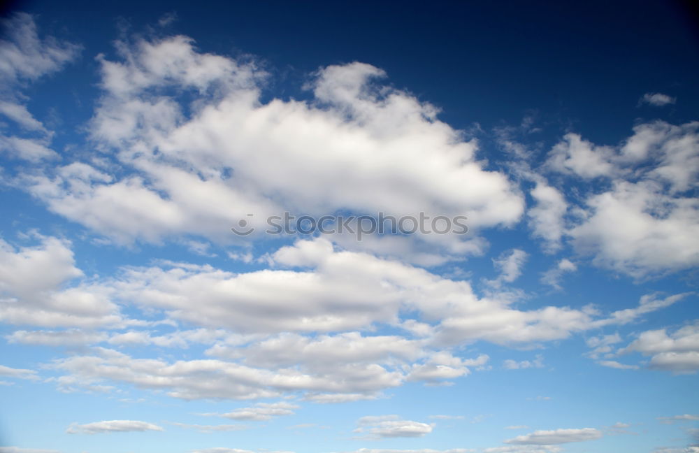 Similar – Great sky over the moor and the hiking group