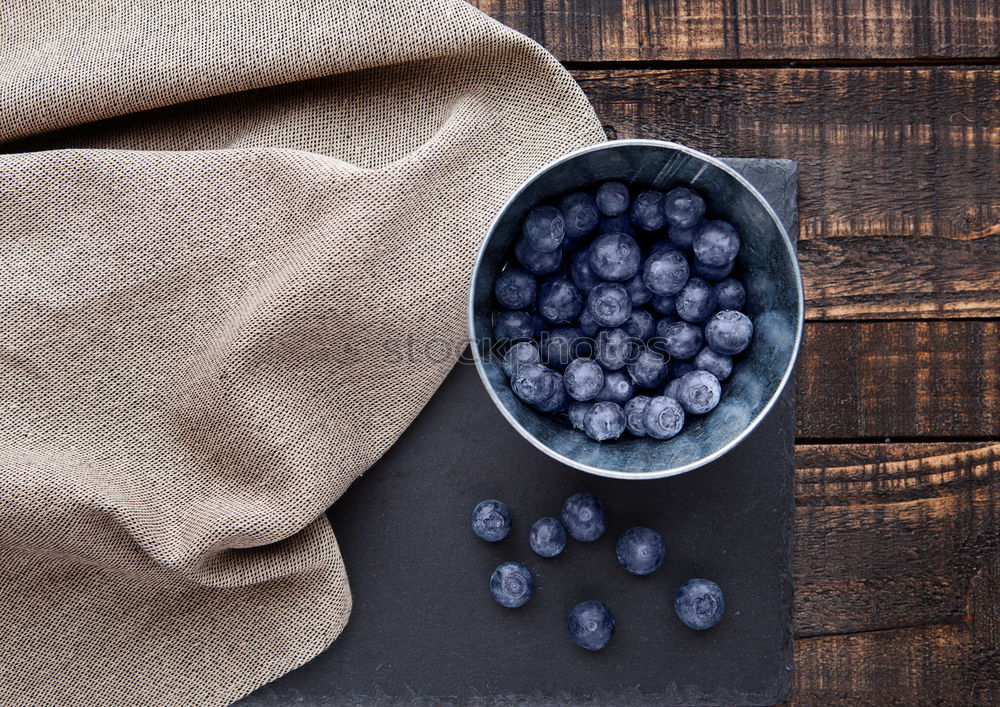 Similar – Image, Stock Photo Freshly gathered blueberries put into ceramic bowl