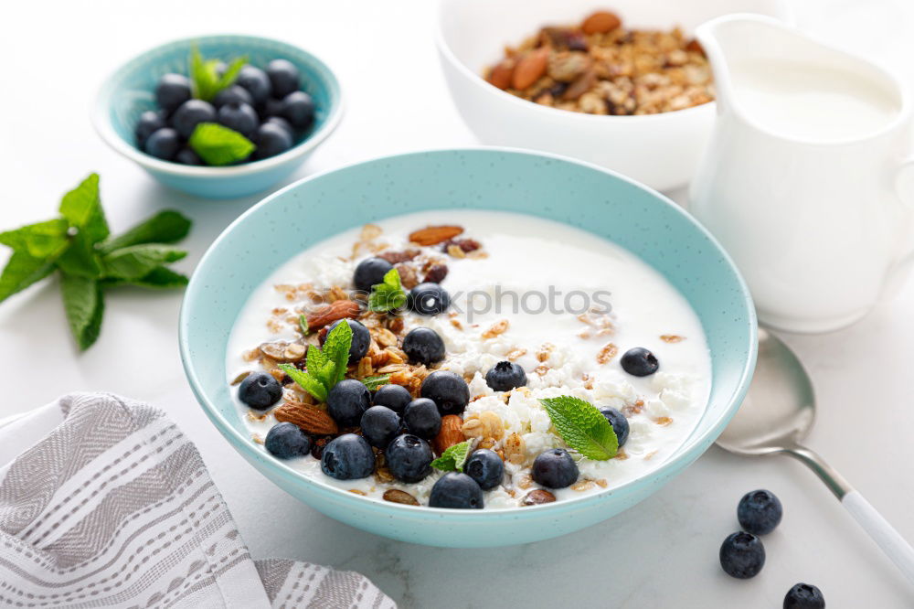 Similar – Image, Stock Photo Muesli with yoghurt and fruits on wood