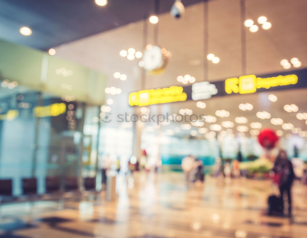 Similar – Image, Stock Photo Black Woman looking at the timetable information panel in the airport with a suitcase