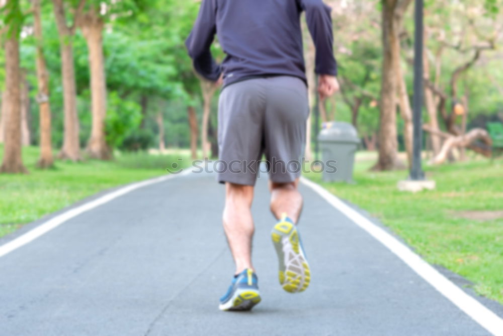 Similar – Rear view of black man running in urban background.