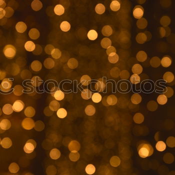 Similar – luminous cross with candles and christmas tree as old Bokeh