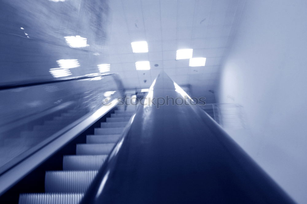 Similar – escalator Rolltreppe