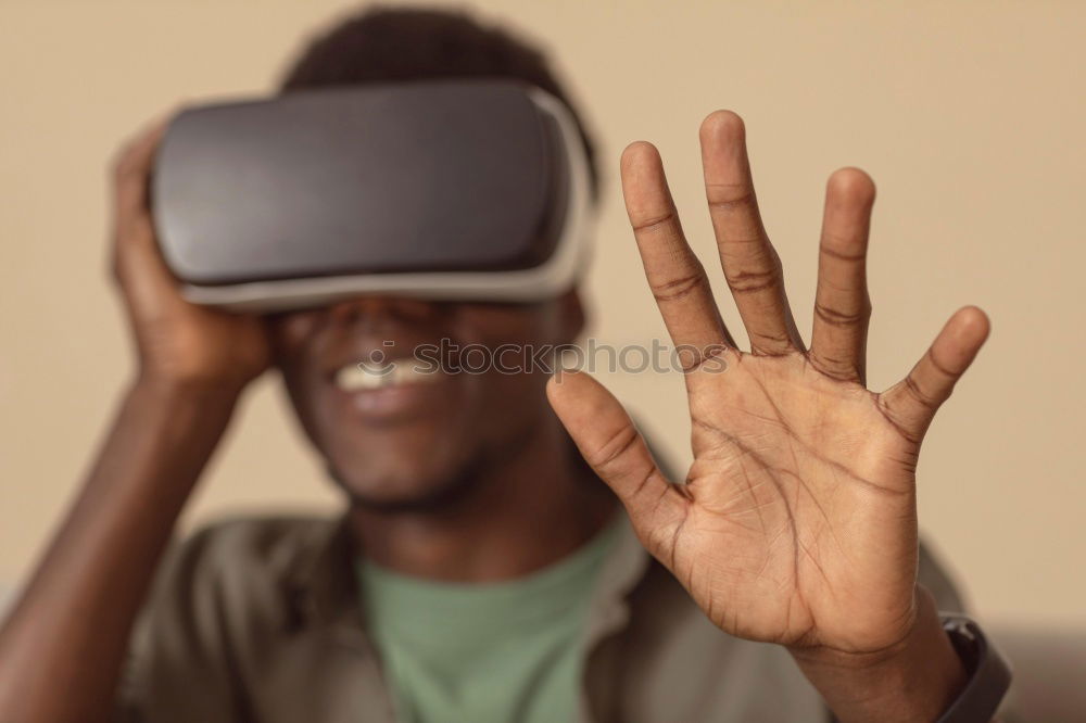 Image, Stock Photo Father and son playing with VR glasses.