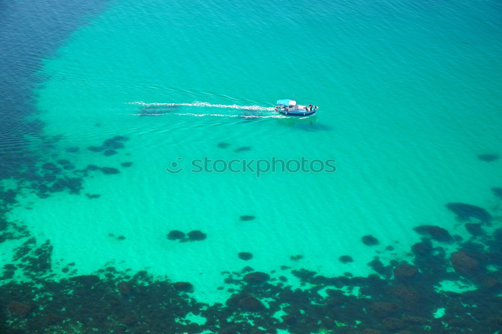 Similar – Boat in the waves