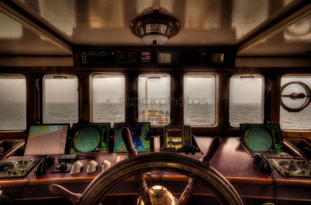 Similar – Steering wheel of a sailing ship