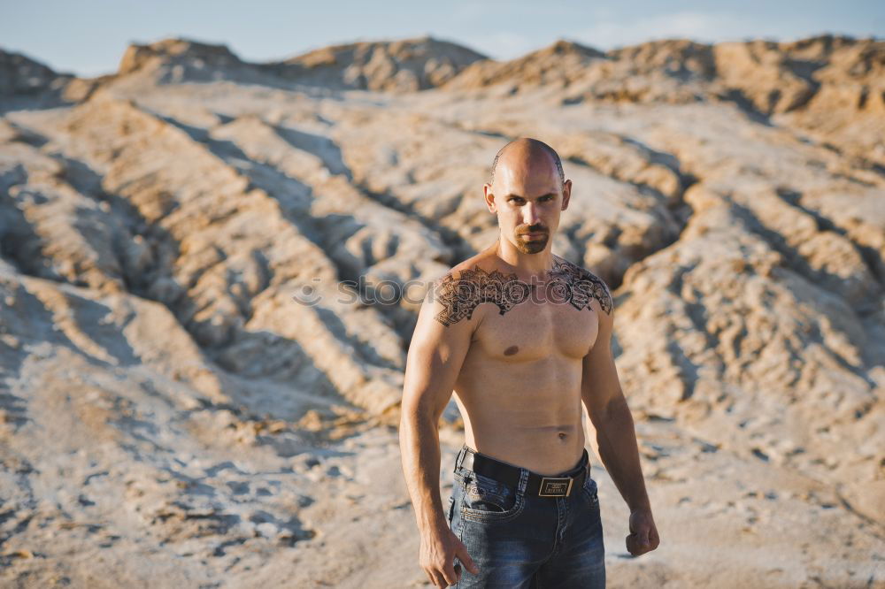 Similar – Image, Stock Photo Shirtless muscular bearded man in Icelandic nature