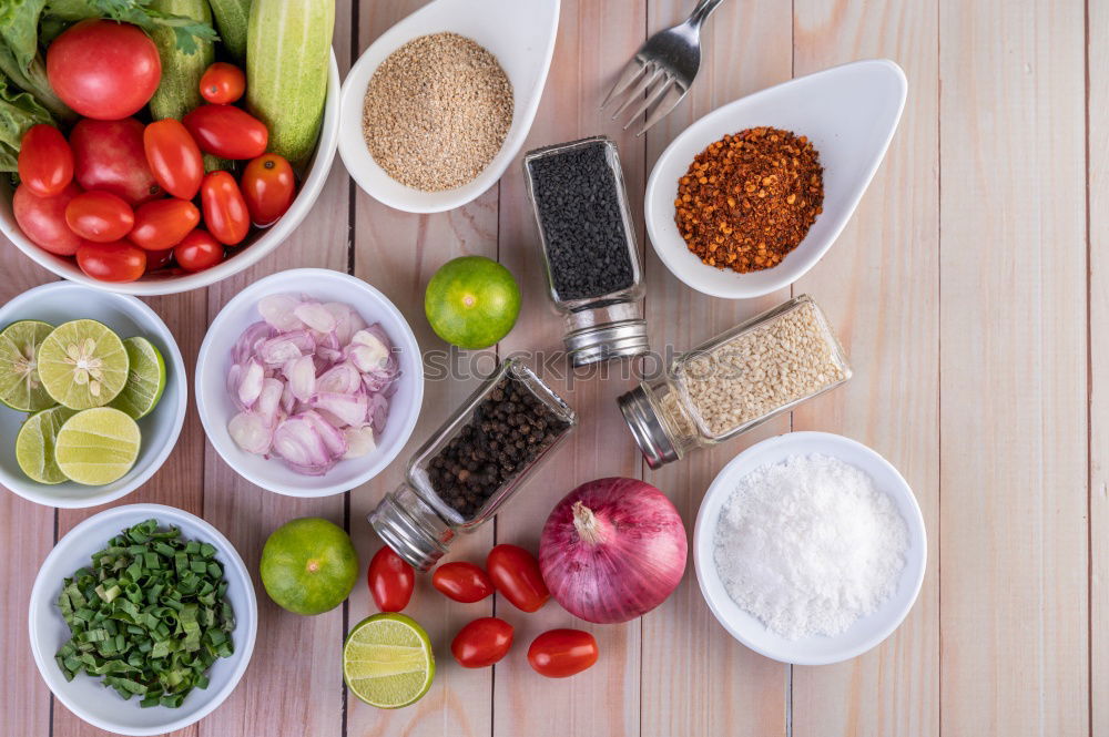 Similar – Couscous with vegetable ingredients in bowls