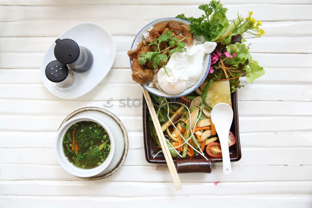 Similar – Image, Stock Photo Modern sustainable food delivery with eco friendly packaging and cutlery. Healthy Asian take away food : salad bowl with salmon on grey concrete kitchen table. Top view.