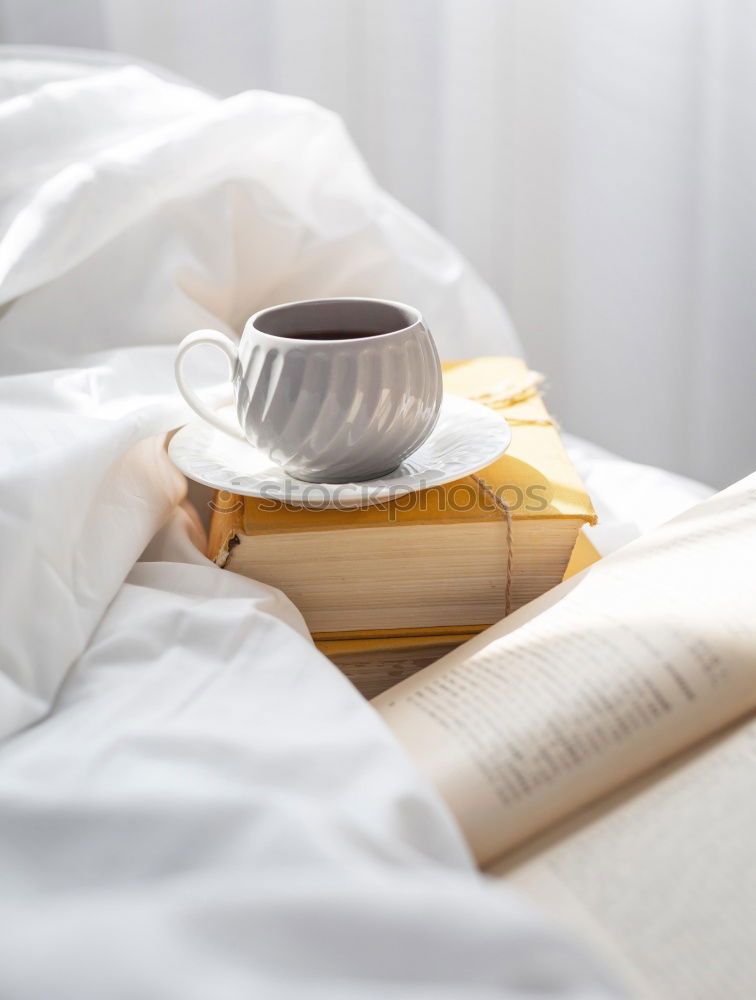 Similar – Image, Stock Photo Cup of coffee and spoon on wooden tray in bed on white sheets