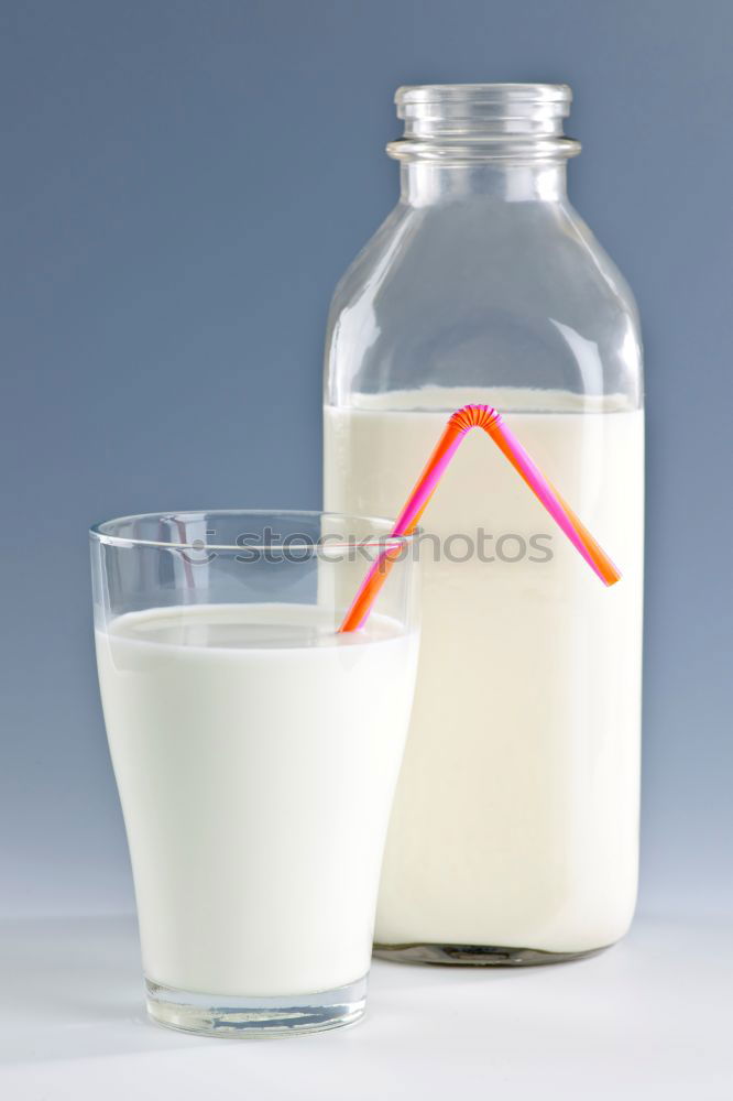 Similar – Flasche mit Milch und Glas Milch