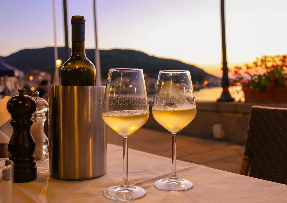 Similar – Bottle of red wine and table set on the veranda