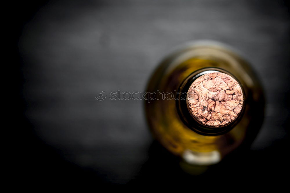 Similar – Image, Stock Photo Red wine bottle with red wine glass and grapes on black