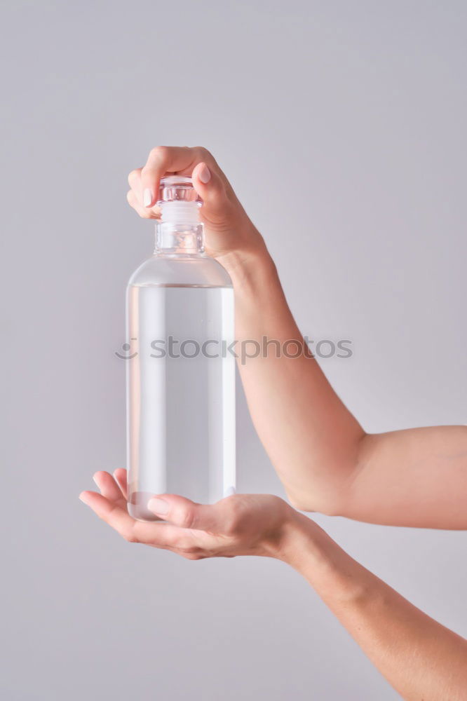 Similar – Boy holding vase with water near face