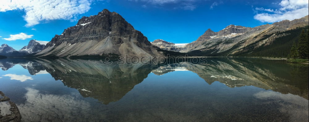 Similar – Image, Stock Photo Lake in snowy rocky mountains