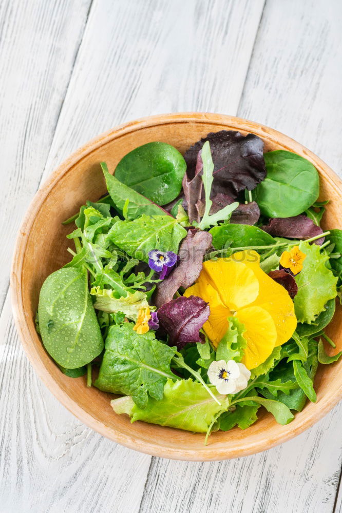 Similar – Spring salad of baby spinach, herbs, arugula and lettuce