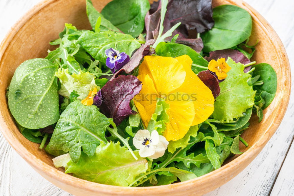 Similar – Image, Stock Photo Fresh vegan salad with edible flowers