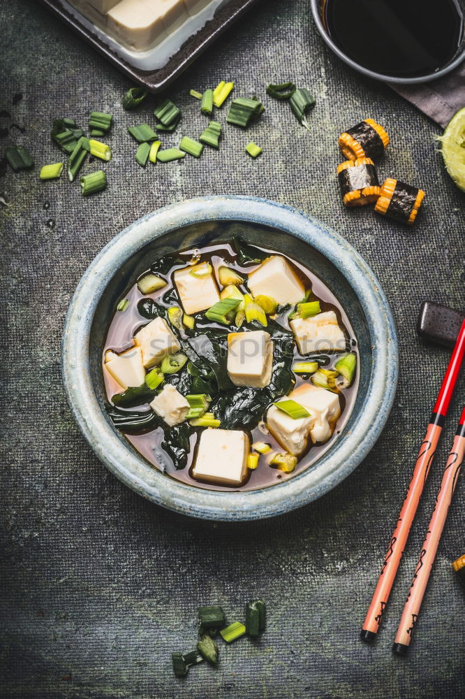 Similar – Geometric bowl of Asian Noodle Soup with chopsticks