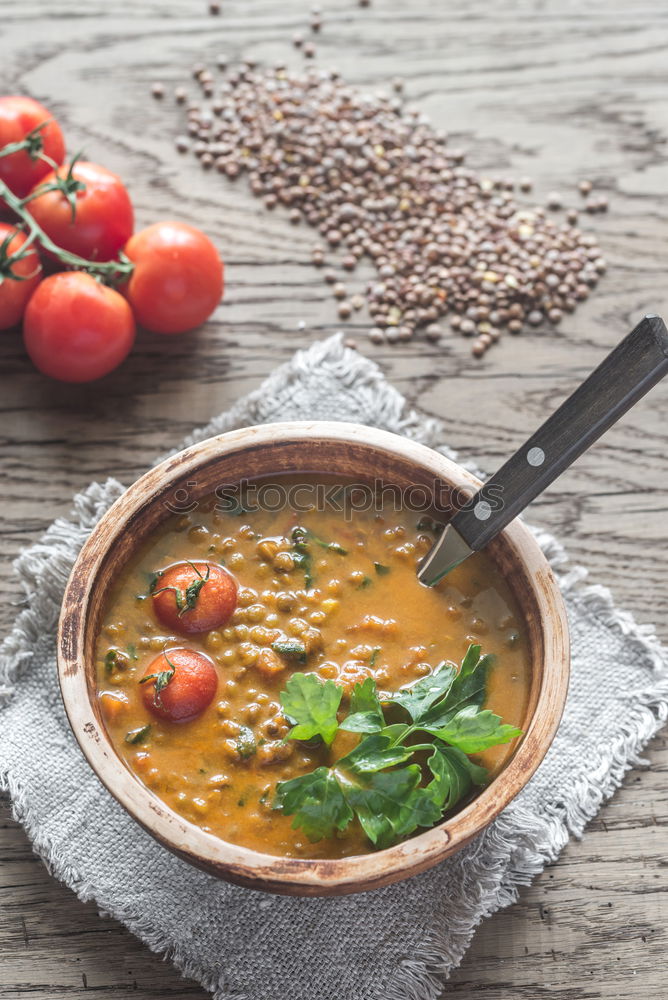 Similar – Image, Stock Photo Vegan lentil soup in bowl with spoon