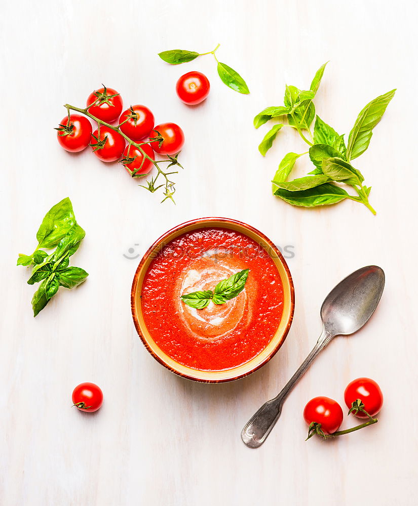 Fresh tomato soup with ingredients