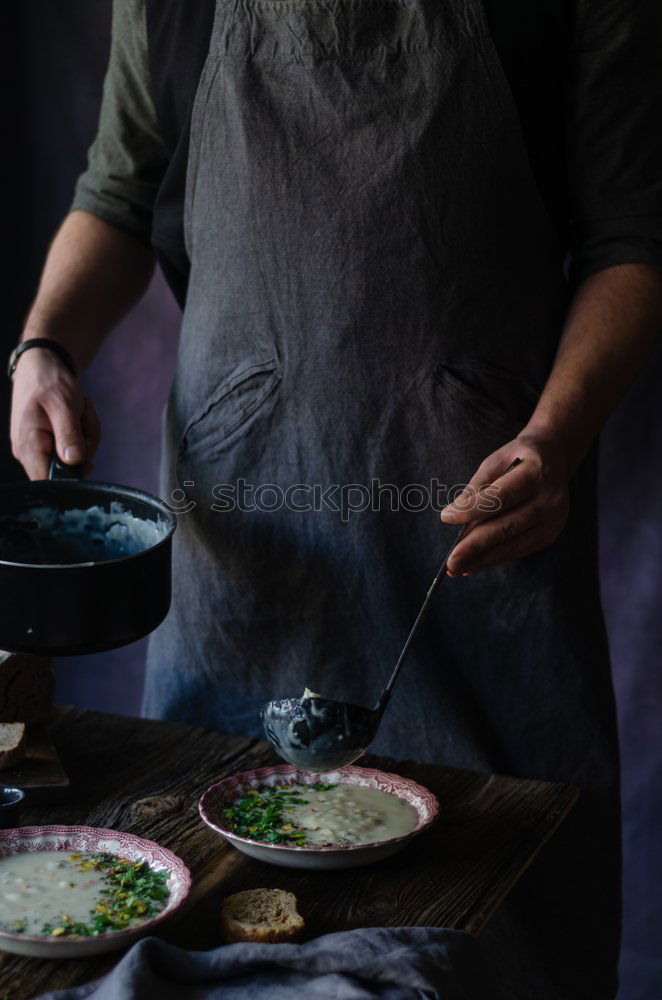 Similar – Image, Stock Photo Cook putting custard on tart