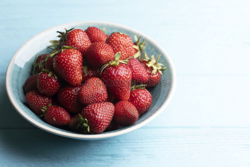 Similar – Strawberries in a bucket on a white wooden table