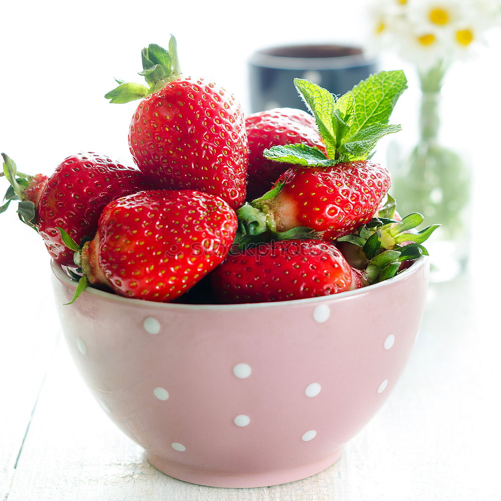 Similar – Strawberries in a bowl on a white wooden table