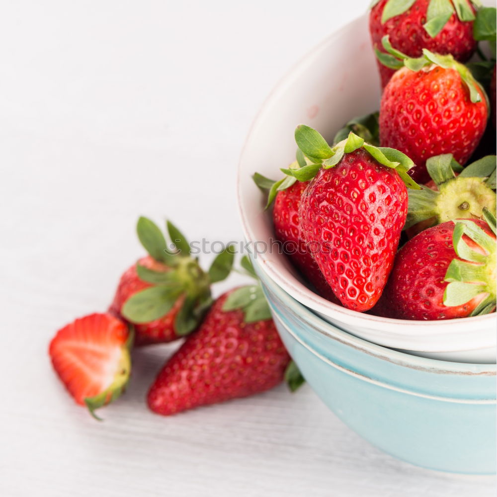 Similar – Strawberries in a bucket on a white wooden table