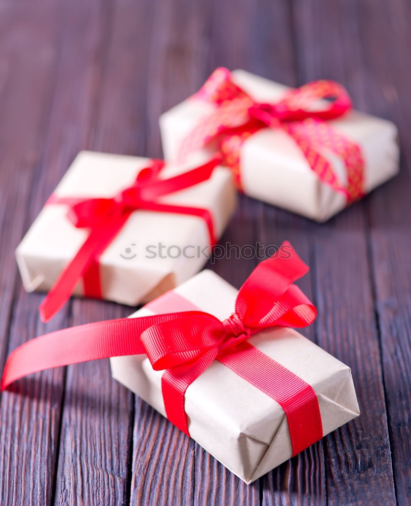 Similar – Image, Stock Photo Some christmas presents in decorative boxes on a dark background