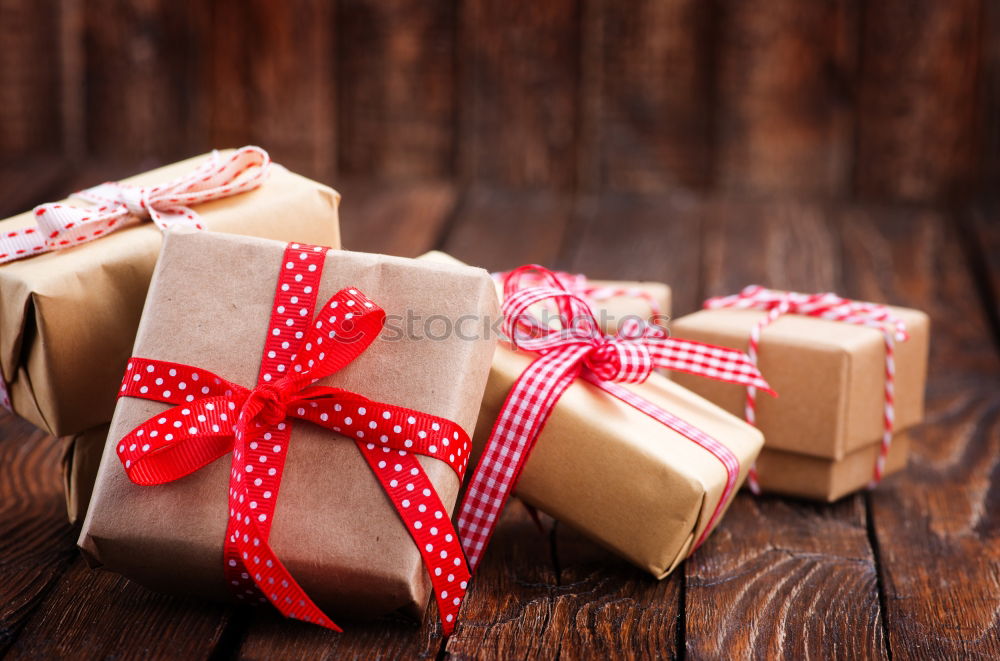 Similar – Image, Stock Photo Some christmas presents in decorative boxes on a dark background