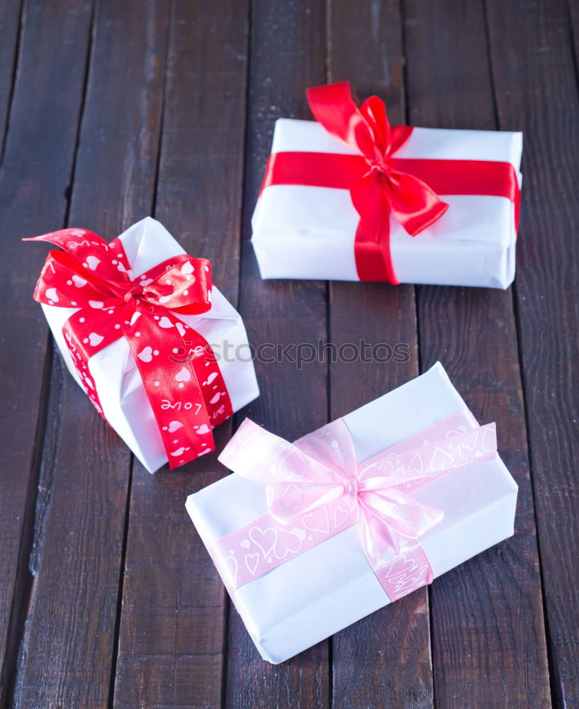 Similar – Image, Stock Photo Gift boxes with red ribbon