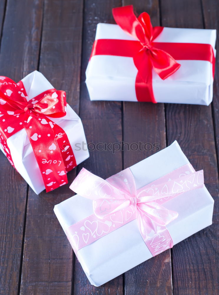 Image, Stock Photo Gift boxes with red ribbon