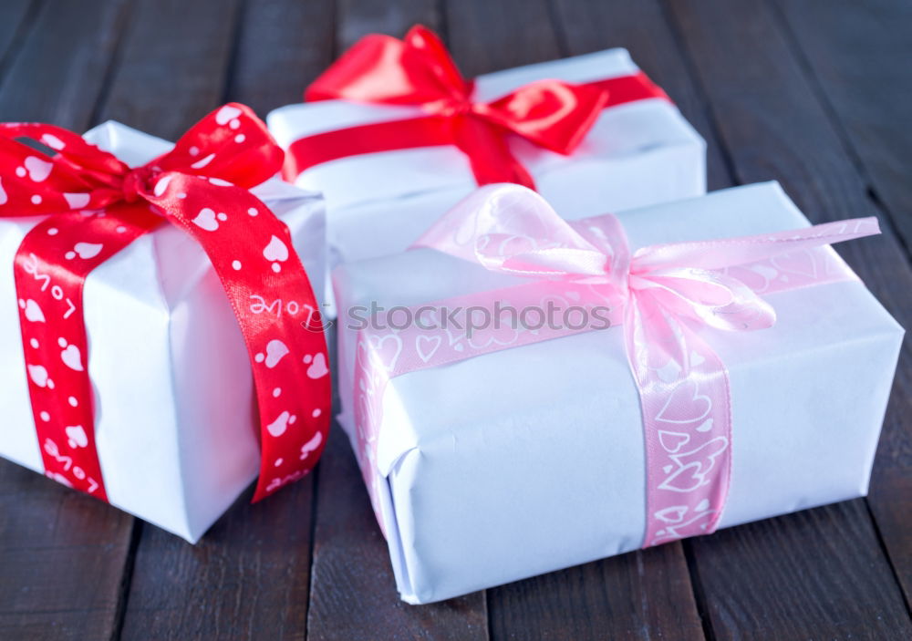 Similar – Image, Stock Photo Gift boxes with red ribbon