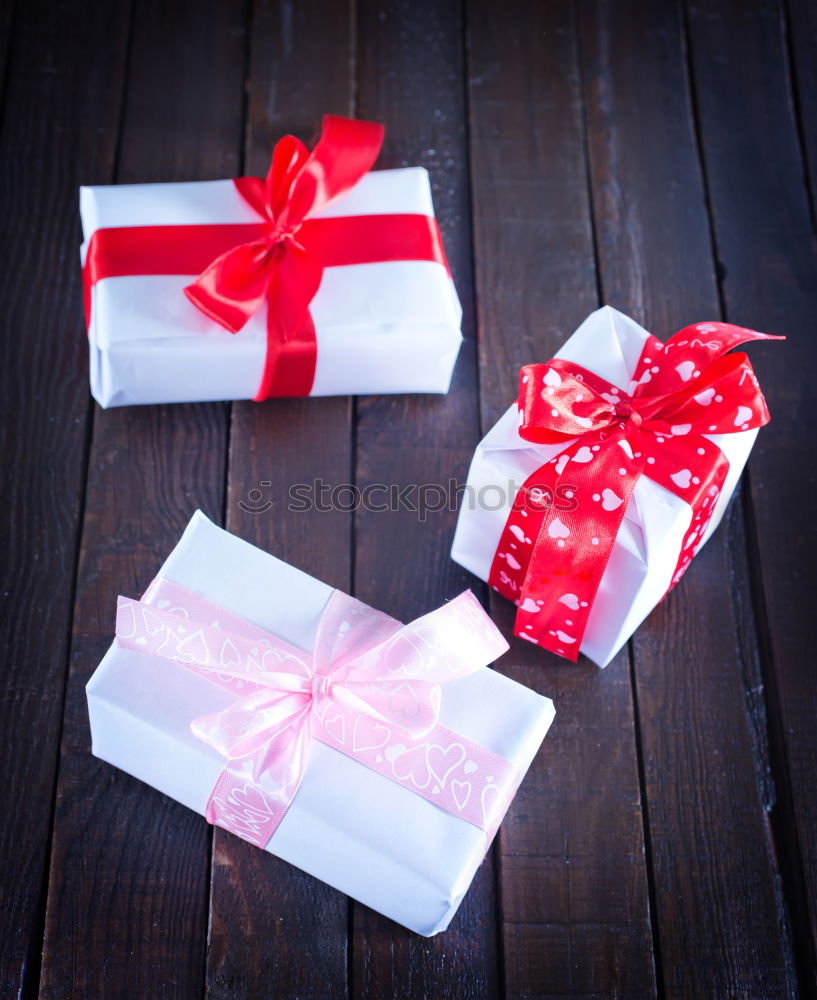 Similar – Image, Stock Photo Gift boxes with red ribbon