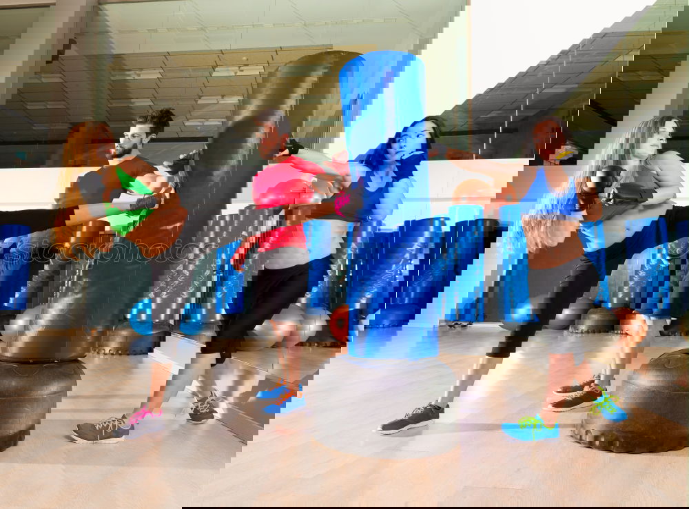 Similar – Image, Stock Photo Women group training over steppers in aerobic class